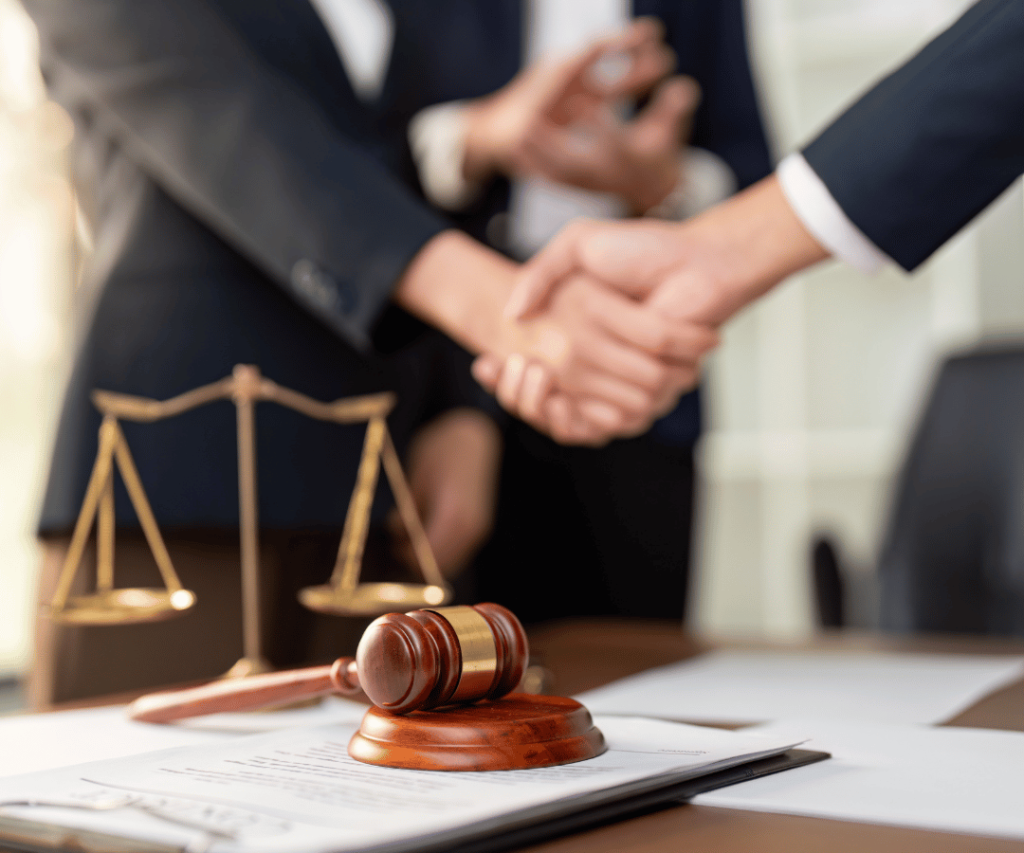 legal picture with handshake and gavel